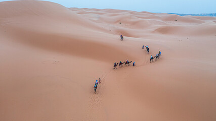 Moroccan Sahara Desert, ancient black volcanic mountains, the Sahara River Oued Ghris, stunning...