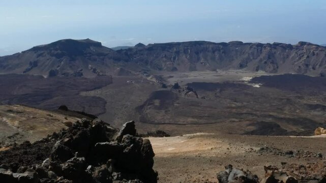 Real 4k footage of camera panning over breathtaking volcanic landscape, left to right pan, no people