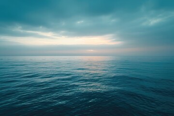 Obraz premium Sailboat on calm waters at golden hour, perfect for travel or leisure use