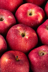 close up of fresh red delicious apples background. 