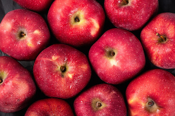 close up of fresh red delicious apples background. 