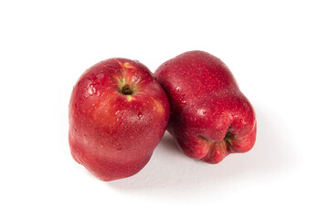 Fresh red delicious apples isolated on white background. 
