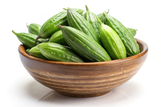 Green Pointed gourd or parwal in a bowl isolated on white background from Worm's Eye View