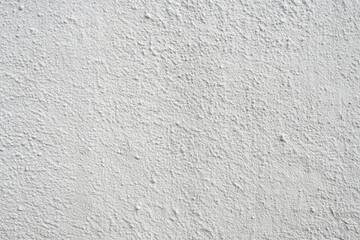 Fototapeta premium Grey cement texture on a white concrete wall background, high angle view