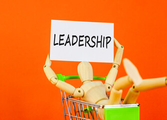 Leadership symbol. Concept word Leadership on beautiful white paper. Beautiful orange background....
