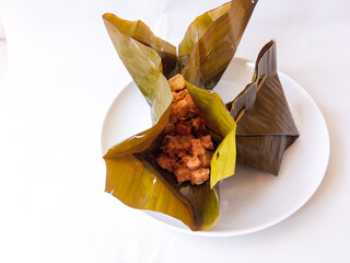 Bothok is a typical Javanese food made from grated coconut, added with chili sauce and side dishes...