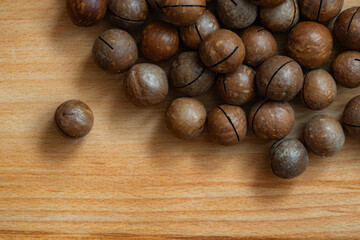 unpeeled macadamia nut textured background