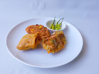 Gorengan : Fried food is one of the most popular types of snacks in Indonesia. Indonesian street food.White background.