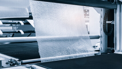 Automatic polyethylene air-bubble packaging roll tape film machine with lighting effect in blue...