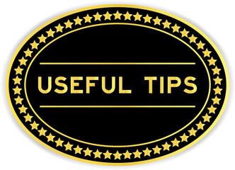 Black and gold color oval label sticker with word useful tips on white background