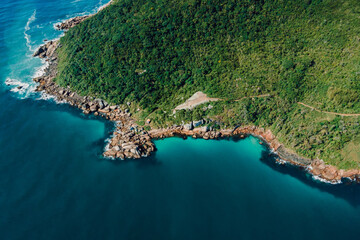 Obraz premium Drone view of coastline with blue Atlantic ocean in Brazil.