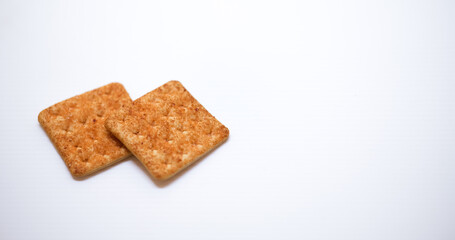 Sugar coated biscuits, sugarless healthy malkist cracker biscuits isolated on white background.
