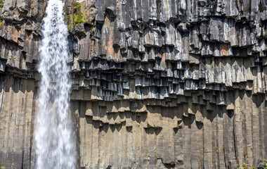 close-up of the hexagonal basalt columns and Svartifoss waterfall, Skaftafell, South Iceland