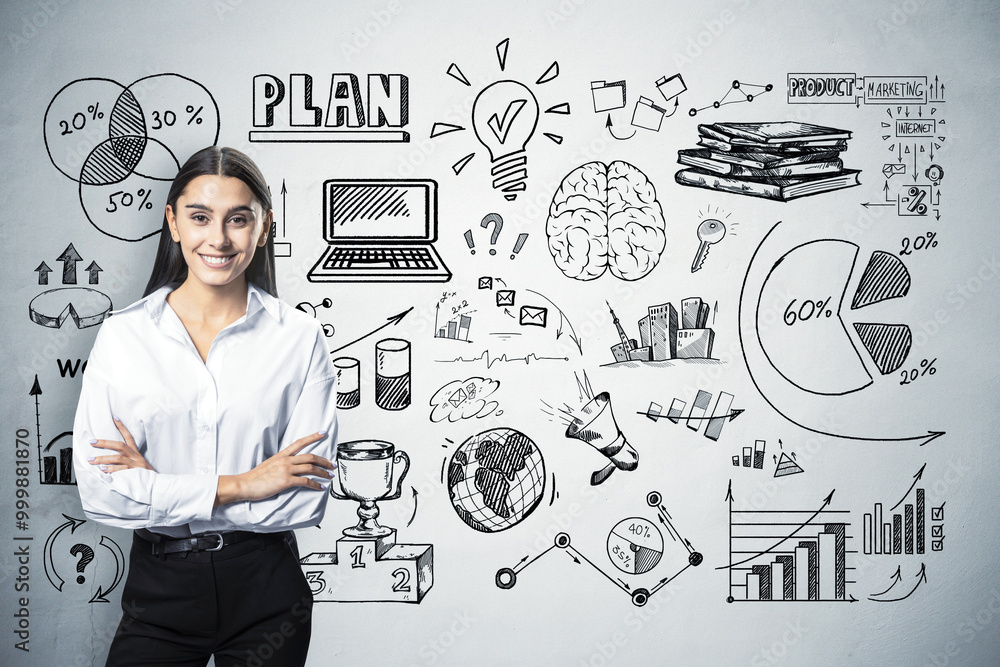 Poster smiling businesswoman in front of wall with business sketches and diagrams.