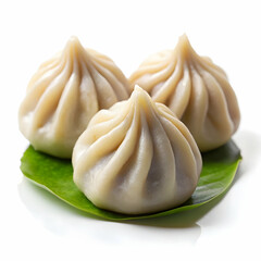 fresh steamy modak dumpling isolated on white background