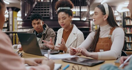University, people and group in library with laptop for educational discussion, exam preparation or learning. Diversity, students and books for scholarship, knowledge research and assignment teamwork
