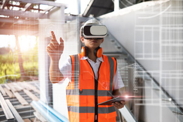 Asian architect engineer using VR tablet graphical ui screen simulation plan design blueprint, futuristic program architectural innovation, construction site building project using modern technology.