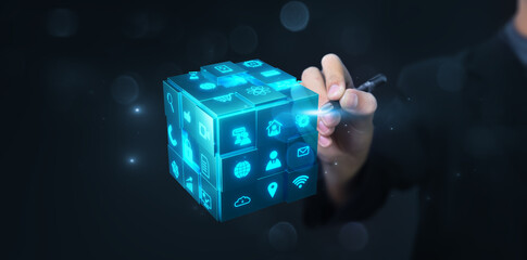 Business tech cube futuristic technology concept, modern 3D render cube model, businessman finger pointing block of internet communication information data innovation technology, blue background