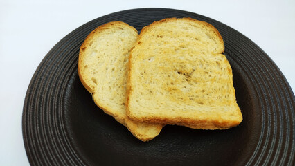 Dark plate with two toasts
