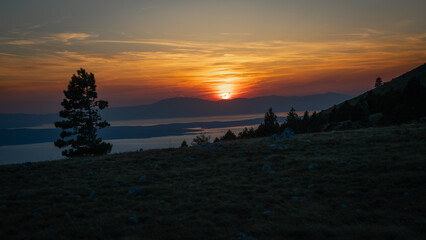 Sunset with lots of foreground over the Croatian Adriatic coast.
