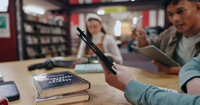 People, studying and hands with tablet in library for group project, research and information. University, student and planning with technology at campus for higher education, assignment or knowledge