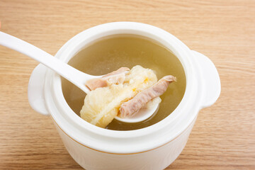 A bowl of pork belly and fish maw stew