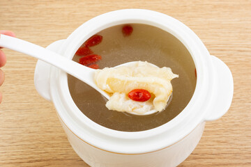 A bowl of pork belly and fish maw stew