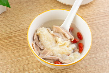 A bowl of pork belly and fish maw stew