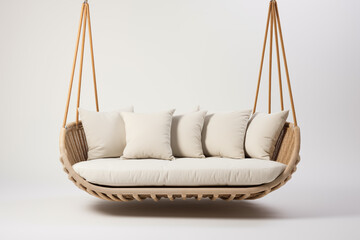  A sleek, modern white swing sofa with smooth cushions and a minimalist frame, hanging from a sturdy wooden beam. The swing is set in a bright, sunlit outdoor space with clean
