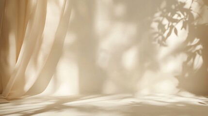 A cream-colored backdrop with sheer curtains and leaf shadows.