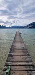 Camping by Lake Wolfgangsee offers a serene experience with access to swimming beaches and piers. Visitors can enjoy the clear waters of Wolfgangsee, relax on the beach, or take a swim. The piers prov