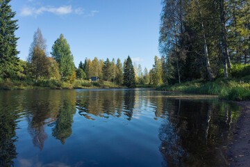 Lake with clean and clear water deep in the forest.