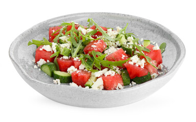 Delicious watermelon salad with feta cheese, cucumber and arugula isolated on white