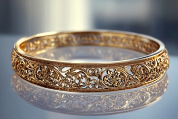 Ornate Gold Bracelet with Intricate Floral Design