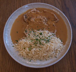 Pork steak with rice in Austria,Europe
