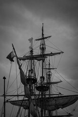 Low angle view ship mast against the sky