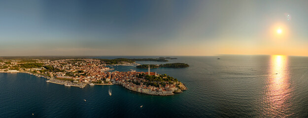 Beautiful sunset over Rovinj, Croatia, showcasing coastal charm and vibrant city life