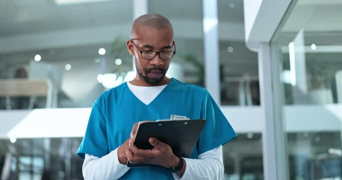 Walking, nurse and man in hospital with chart, inspection and notes for healthcare management. Writing, admin and medical professional in lobby with folder, checklist or schedule planning for clinic