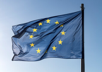 Flag of EU flying in the wind with a blue sky background...country, land, european, union, europe,