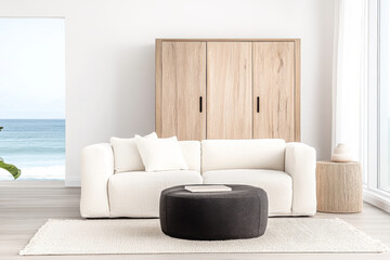 Cozy modern living room with a white couch and ocean view, featuring natural decor elements and soft textiles during the day