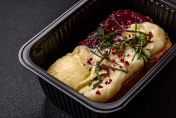 Delicious sweet brioche sandwich with raspberry jam and ricotta cream