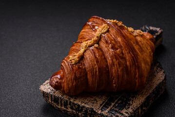 Fresh crispy croissant filled with pistachio cream
