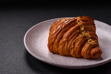 Fresh crispy croissant filled with pistachio cream