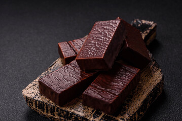Rectangular chocolate candies with mousse and waffles