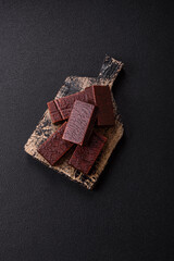 Rectangular chocolate candies with mousse and waffles