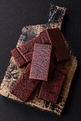 Rectangular chocolate candies with mousse and waffles