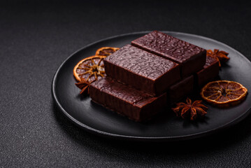 Rectangular chocolate candies with mousse and waffles