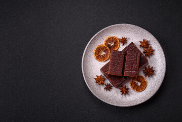 Rectangular chocolate candies with mousse and waffles