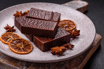 Rectangular chocolate candies with mousse and waffles