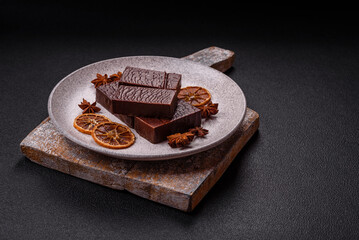 Rectangular chocolate candies with mousse and waffles